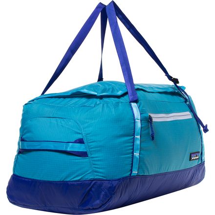 patagonia lightweight black hole duffel 30l sale 70L Large Recycled Travel Bag Coontail The zipped side pocket keeps valuables secure Patagonia Ultralight Black Hole 30L
