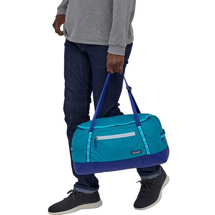 patagonia ultralight black hole duffel bag Hole 30L Worn Wear but with a huge step toward environmental impact reduction with 100% recycled body fabric Patagonia Black Hole Duffel 100